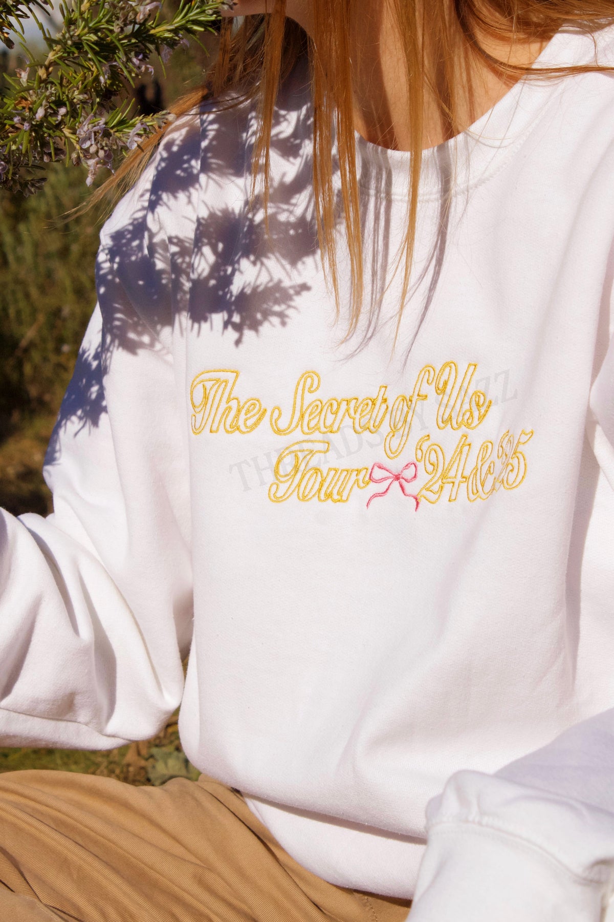 tsou tour · embroidered crewneck